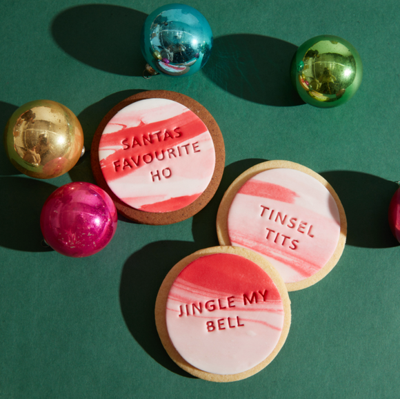 Naughty christmas cookies in red and white marble perfect for a cheeky gift available for naitonal delivery